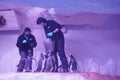 People feeding Penguin in Aquarium