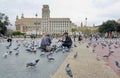 People feeding the pigeons in Catalonia Plaza, Barcelona