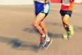 People feet on city road in marathon running race Royalty Free Stock Photo