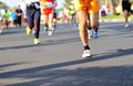 People feet on city road in marathon running race Royalty Free Stock Photo