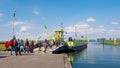 People and ferry leaving Tiengemeten island in Haringvliet estuary, Netherlands Royalty Free Stock Photo