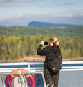 People on a ferry. Passengers on excursion ship or ferry on holiday boat trip in tourism and vacation travel concept