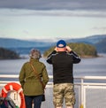 People on a ferry. Passengers on excursion ship or ferry on holiday boat trip in tourism and vacation travel concept