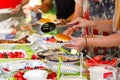 People at a Summer Potluck Picnic