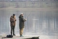 People fishing in Ada lake in winter