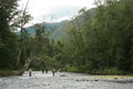 Three anglers in the Russian river. Royalty Free Stock Photo