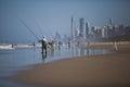 People fishing on beach Royalty Free Stock Photo