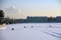 People fishing on a frozen Neva river in historical city center of Saint-Petersburg