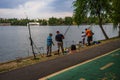 People fishing in King Mihai I park Herastrau park in Bucharest, Romania, 2019. Royalty Free Stock Photo