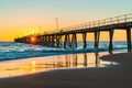People fishing from Port Noarlunga jetty at sunset Royalty Free Stock Photo