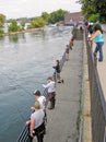 People Fishing for Salmon in the Oswego River Royalty Free Stock Photo