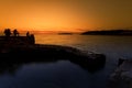 People fishing at sunset Royalty Free Stock Photo