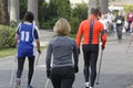 WROCLAW, POLAND - OCTOBER 15, 2017: People in fitness course nordic walking competition in the city park Royalty Free Stock Photo