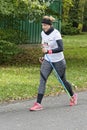 WROCLAW, POLAND - OCTOBER 15, 2017: People in fitness course nordic walking competition in the city park Royalty Free Stock Photo