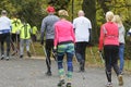 WROCLAW, POLAND - OCTOBER 15, 2017: People in fitness course nordic walking competition in the city park Royalty Free Stock Photo