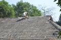 People fix roof. rooftop repairman