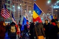 People with flags protesting against corruption, Bucharest, Romania Royalty Free Stock Photo