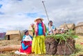 People on floating Uros islands on lake Titicaca in Peru