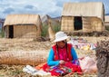 People on floating Uros islands on lake Titicaca in Peru