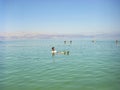 People floating on water in the Dead sea Israel Royalty Free Stock Photo