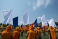 People flying flags in a ceremony Royalty Free Stock Photo