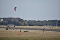 People flying kites at old abandoned Tempelhofer Feld in Tempelhof Berlin Germany Royalty Free Stock Photo