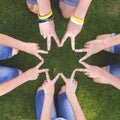 People forming star shape with their fingers. Children have combined hands together. Team work. Unity concept. Royalty Free Stock Photo