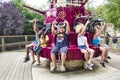 People free falling from tower ride at amusement park. Famous adrenaline attraction Royalty Free Stock Photo