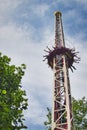 People free falling from tower ride at amusement park. Famous adrenaline attraction Royalty Free Stock Photo