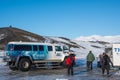 People in front of glacier truck from Ice Explorers