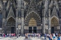 People in front of the historic dom church in Koln