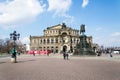 People in front of King Johann horse rider statue, John of Saxony Monument and opera house Semperoper concert hall in Dresden