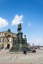 People in front of King Johann horse rider statue, John of Saxony Monument and opera house Semperoper concert hall in Dresden