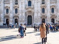 People in front of Milan Cathedral in morning