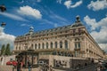People in front of the Quai d`Orsay Museum facade in Paris.