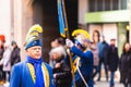 People in fun costumes celebrating at the carnival Fasching on Rose Monday parade in the city