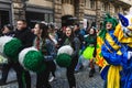 People in fun costumes celebrating at the carnival Fasching on Rose Monday parade in the city