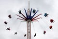 People on fun fair Swing ride
