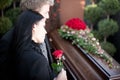 People at Funeral with coffin