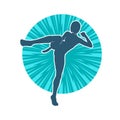 Silhouette of a woman doing a martial art kick. Royalty Free Stock Photo