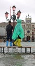 People with gaiters and rainproof raincoats during the rain in P Royalty Free Stock Photo