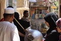 People gather infront of foul traditional Egyptian food