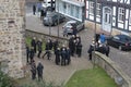 People gathered for a funeral near a German church