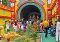 People gathered inside a Durga Puja pandal to offer prayer to Goddess Durga during Durga Ashtami