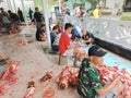 06.29.2023 people gathering in local mosque cutting meat in celebration of eid al adha , Magelang central java Indonesia