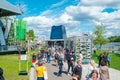 People gathering in park during business event