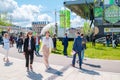 People gathering in park during business event