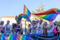 People gathering with rainbow flags in gay pride day in Torremolin