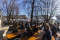 People in a german Biergarten Outdoor Beer Pub at the Viktualienmarkt Victuals Market in Munich during the first wave ofCorona