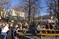 People in a german Biergarten Outdoor Beer Pub at the Viktualienmarkt Victuals Market in Munich during the first wave ofCorona